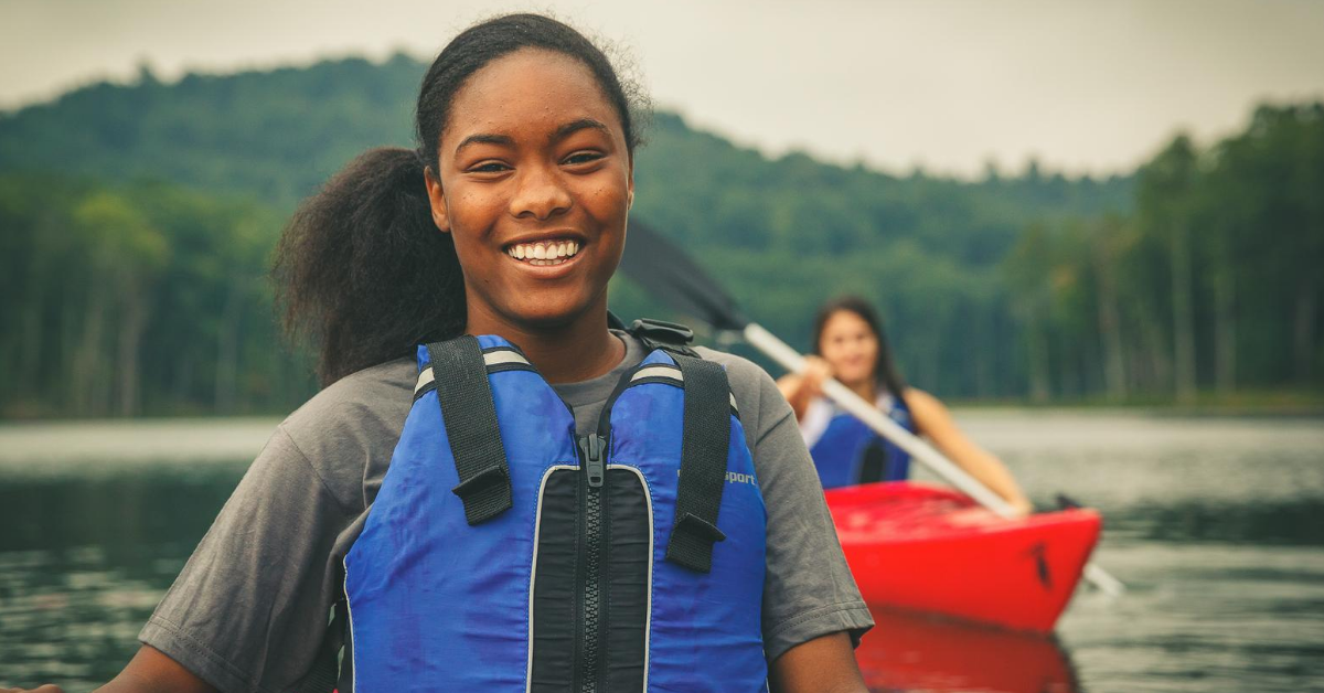 Teen girls enjoy kayaking