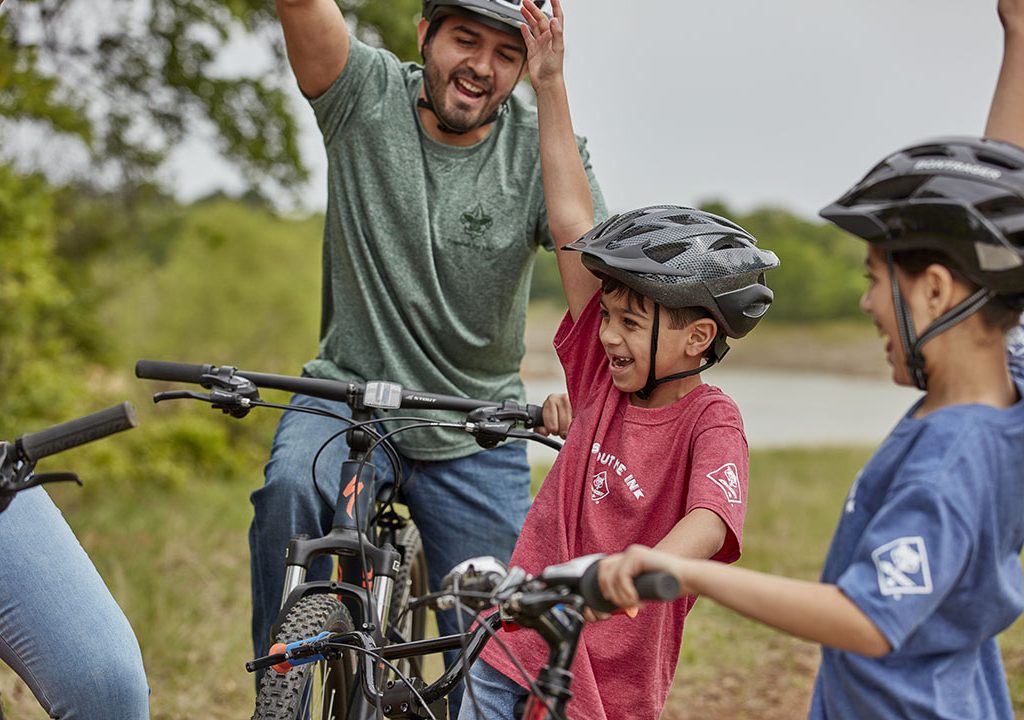 Cub Scouts and adult volunteers enjoy a bike outing