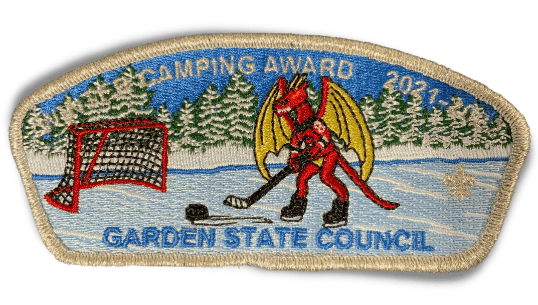 Garden State Council Winter Camper Award patch for 2022 shows a cute Jersey Devil playing ice hockey